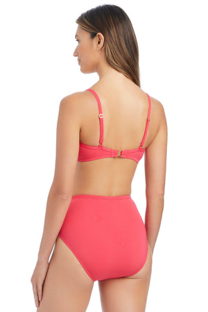 Blue bandeau bikini top with tie front detail from Bleu Rod's Ahoy, Captain! collection, styled over the shoulder.