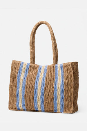 Natural beige Bleu Rod Beattie Meet Me In Naples tote bag with shoulder straps and spacious interior for carrying essentials.