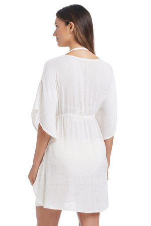 Golden Hour Bleu Rod caftan cover-up with flowing fabric and intricate patterns, perfect for beach or poolside wear.