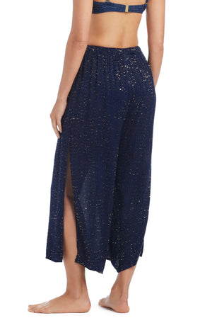 Golden Hour side slit cover-up pant by Bleu Rod, lightweight flowy fabric with a relaxed fit and stylish slit detail.