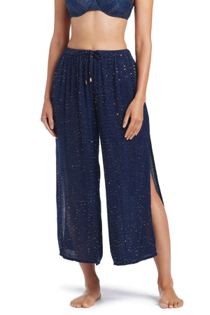 Midnight blue side slit cover-up pant from Bleu Rod's Golden Hour collection, featuring a relaxed fit and stylish design.
