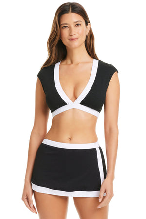 Blue Bleu Rod cap sleeve crop top bikini top with band logo and fitted design, perfect for stylish beachwear or poolside lounging.