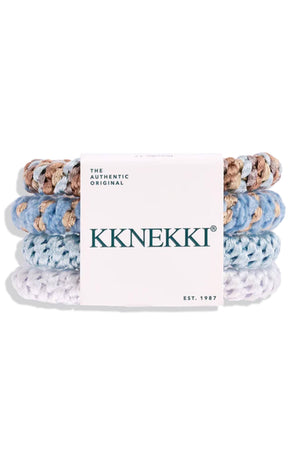 A set of four knotted hair ties wrapped in a white paper band with the brand name 'KKNEKKI' printed in dark green. The hair ties are knotted in various pastel and neutral colors including light blue, white, tan, and brown.