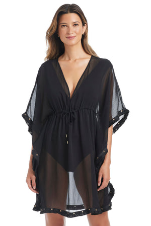 Black Fringe Benefits caftan coverup by Bleu Rod, featuring flowing fabric and fringe details, perfect for beach or poolside wear.
