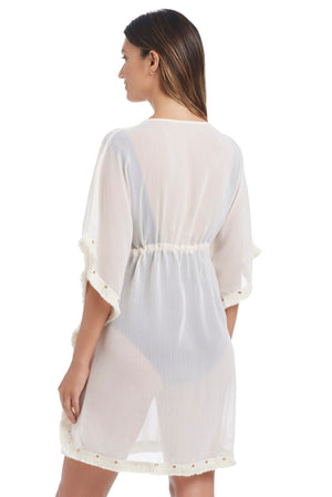 Blue Bleu Rod Fringe Benefits caftan coverup with fringe details, shown from the back in a coconut water color.
