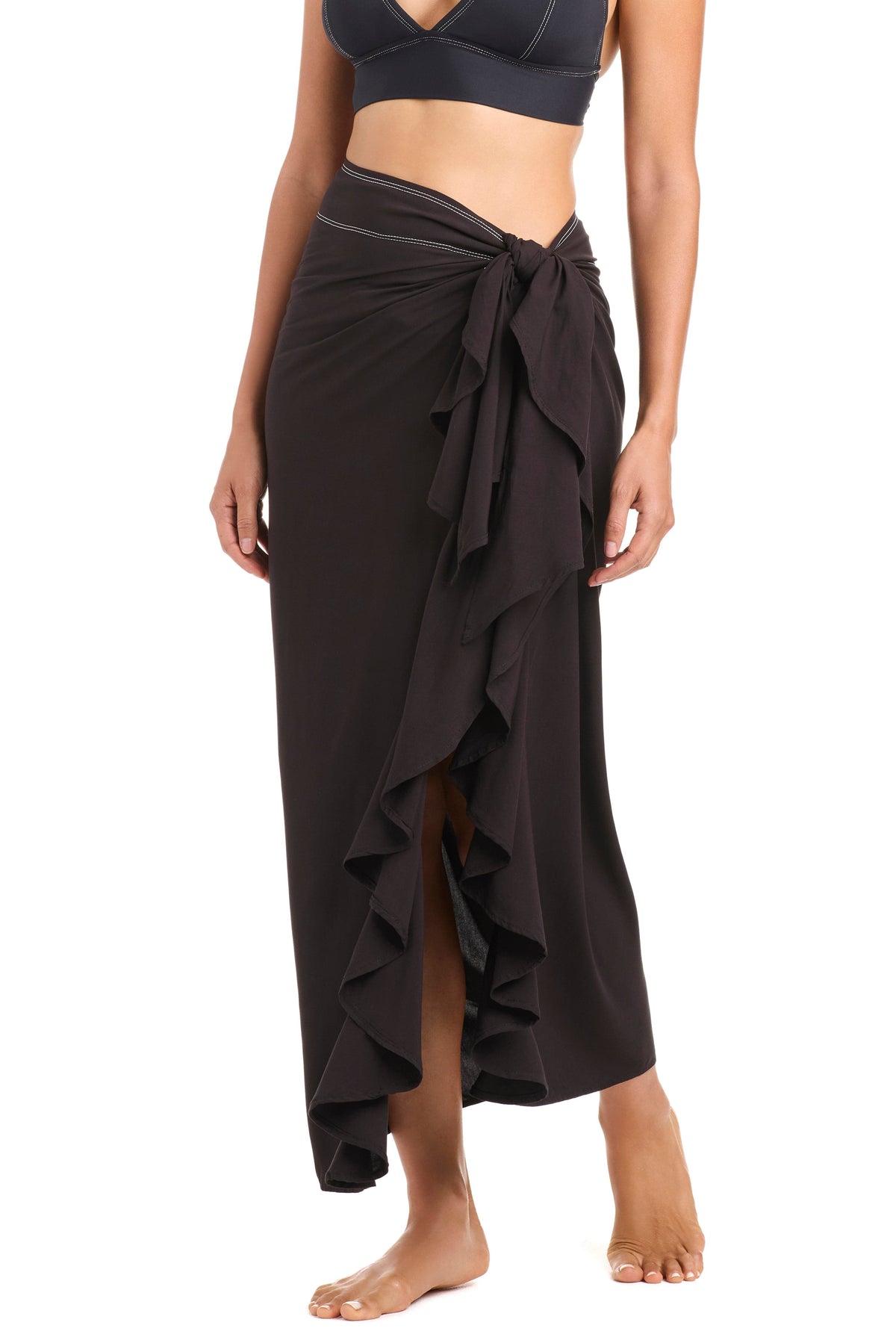 Black Bleu Rod A Fine Line 2026 pareo coverup, lightweight and stylish beachwear, draped fabric with subtle pattern details.