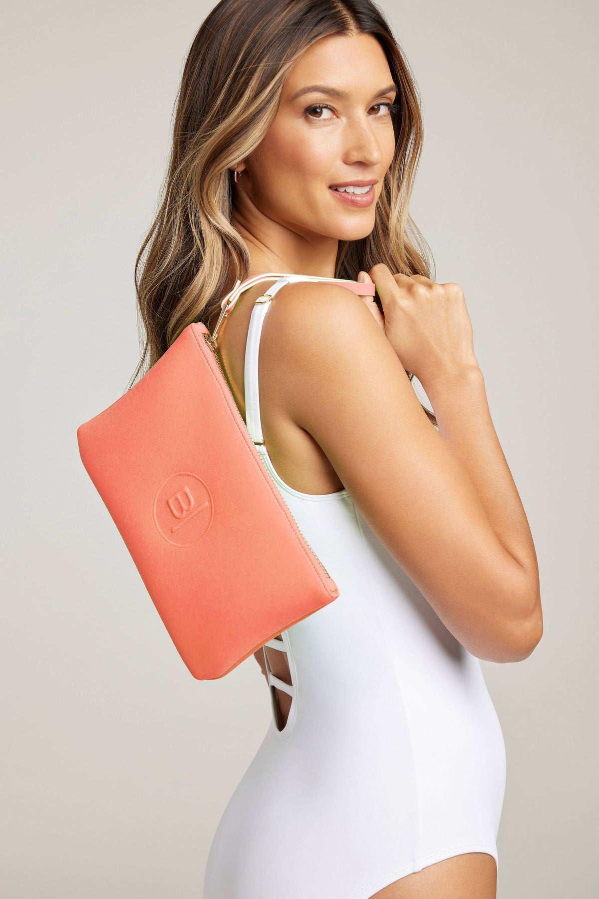 Coral limited edition neoprene bag by Bleu Rod Accessories, stylish and lightweight tote with sleek design and durable material.