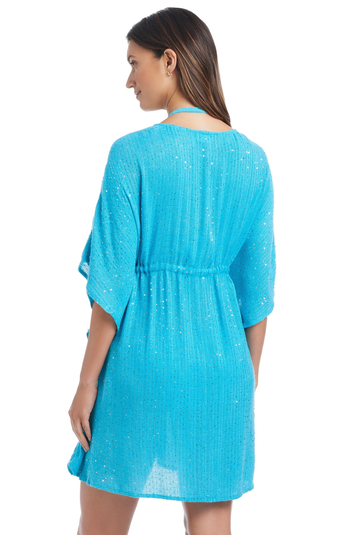 Golden Hour Bleu Rod caftan cover-up with flowing fabric and vibrant patterns, perfect for beach or poolside wear.