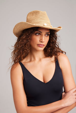 Wyeth Reed Cowboy Hat in Natural color, wide-brim hat made from straw with a band, stylish and suitable for outdoor wear.