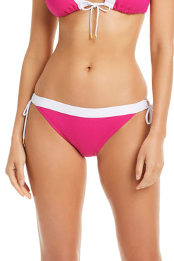 Pink punch I’m With The Band tie-side hipster bikini bottom by Bleu Rod, featuring a stylish, comfortable fit with side tie details.