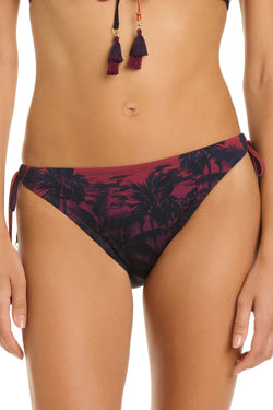 Blue and orange La Caleta Sunset string tie side hipster bikini bottom with vibrant tropical print and adjustable ties at the sides.
