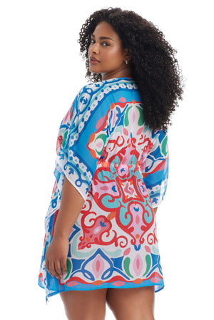Plus size Ibiza Bohemia Caftan Coverup by Bleu Rod Plus, flowing boho-style beachwear with vibrant patterns and lightweight fabric.