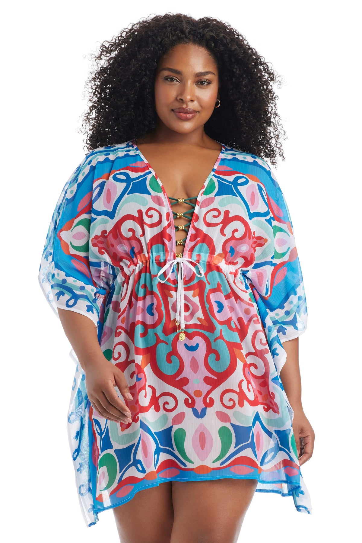 Plus size Ibiza Bohemia Caftan Coverup by Bleu Rod Plus featuring colorful bohemian print and flowing fabric.