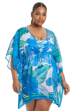 Blue Riviera Retreat Caftan cover-up by Bleu Rod Plus, flowing lightweight fabric with tropical print for beachwear.