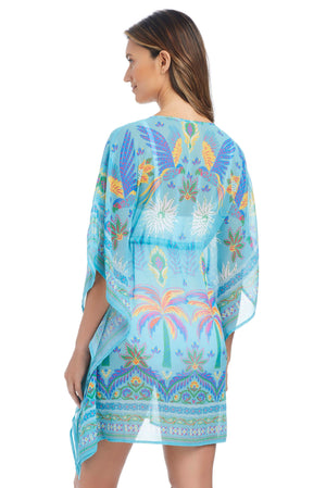 Blue Bleu Rod Summer Solstice Caftan Coverup with flowing fabric and vibrant patterns, perfect for beach or poolside wear.