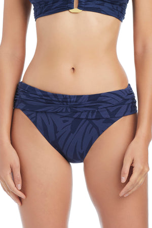 Blue Bleu Rod Tropical Tango bikini bottom, hipster style, with a midnight tropical tango sarong pattern, shown on a model.