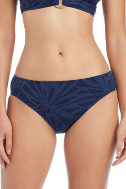 Blue Bleu Rod Tropical Tango basic hipster bikini bottom with a midnight tropical print, showing a close-up of the fabric and fit.