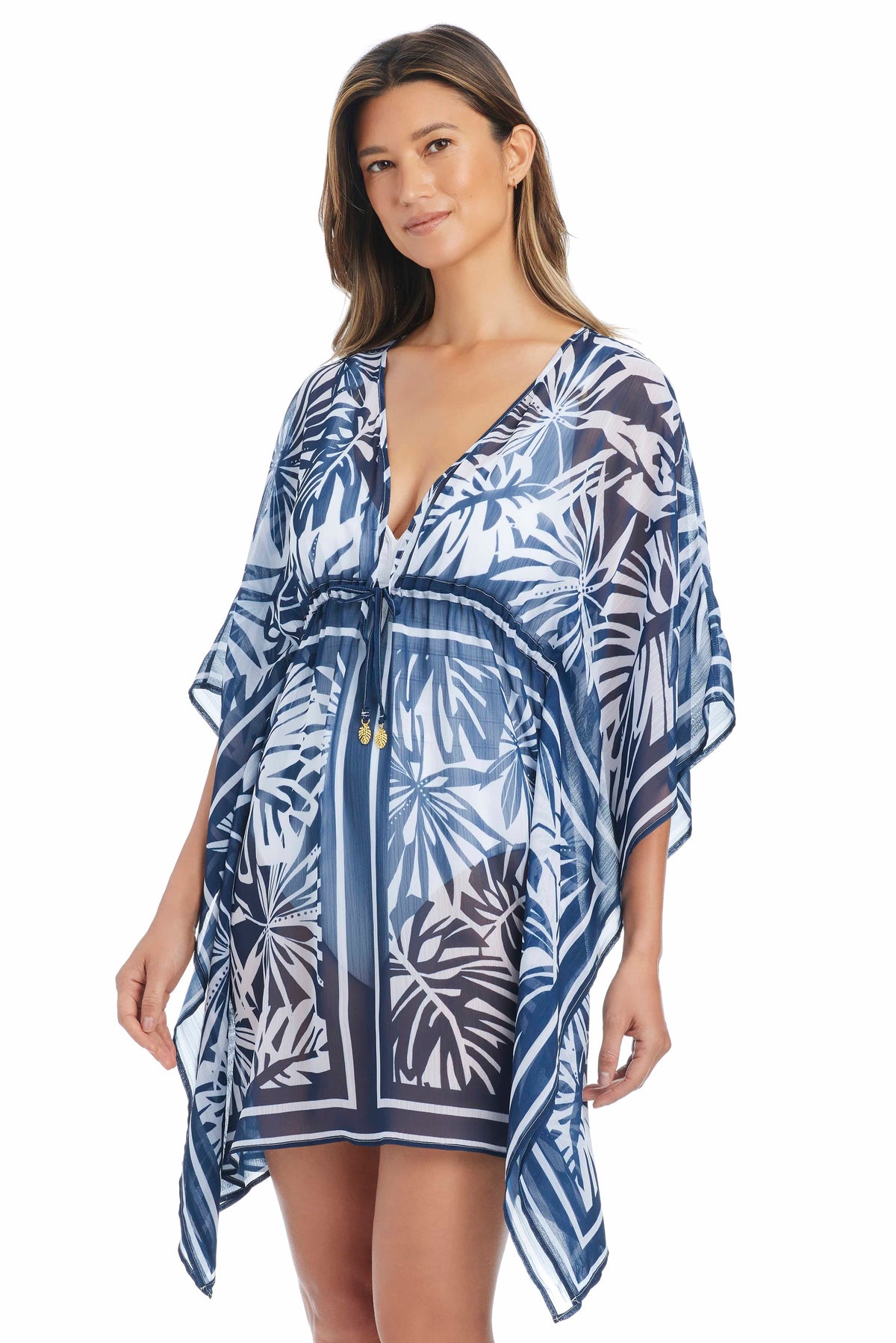 Blue and white tropical floral caftan cover-up by Bleu Rod Tropical Tango, flowing lightweight fabric with vibrant pattern.