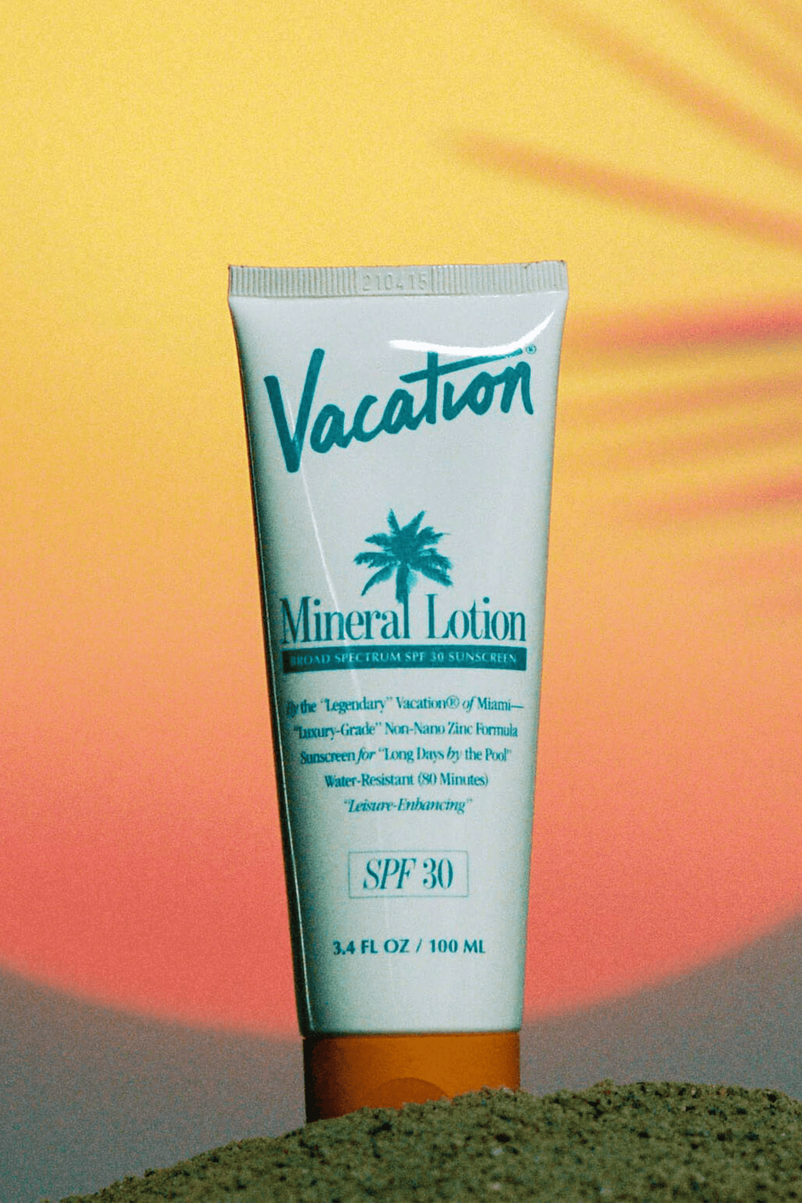 Vacation Mineral Lotion SPF 30 sunscreen bottle, creamy texture, and pump dispenser, designed for sun protection and skin care.